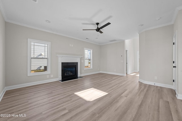 unfurnished living room with ceiling fan, light hardwood / wood-style flooring, and ornamental molding