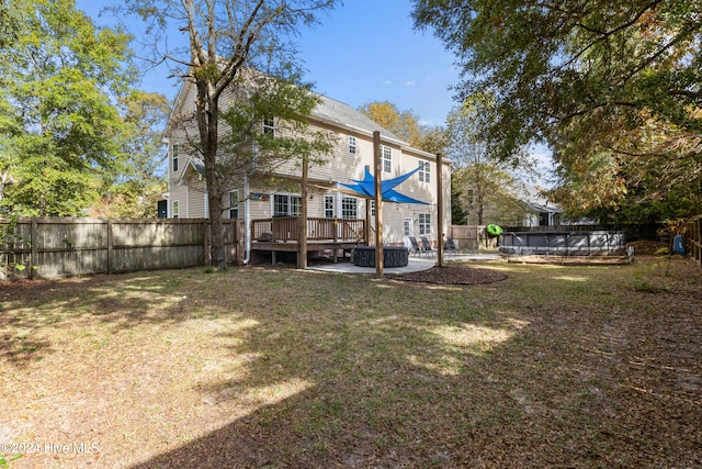 view of yard featuring a pool side deck