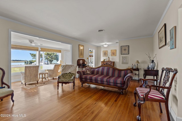 1701 Front St, Beaufort, NC 28516 - living room with light wood-type flooring and ornamental molding