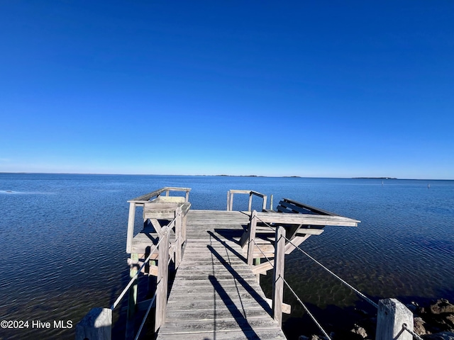 view of dock with a water view