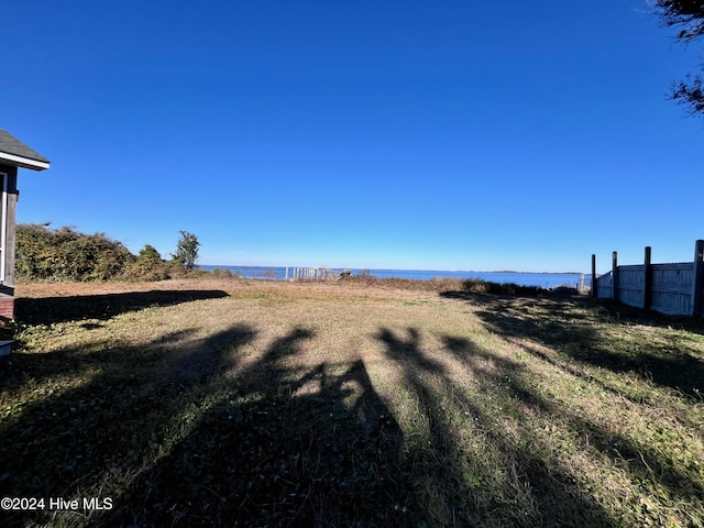 view of yard with a water view