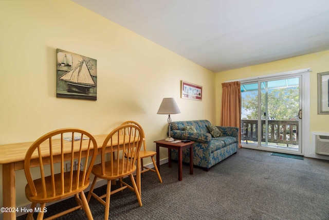 interior space featuring dark colored carpet