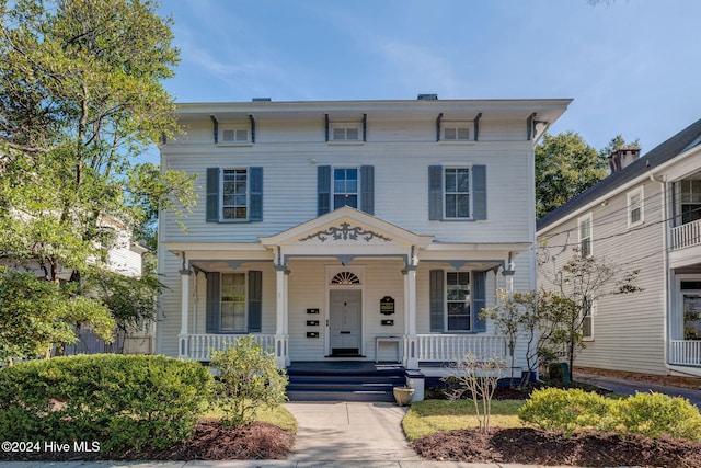 italianate house featuring a porch