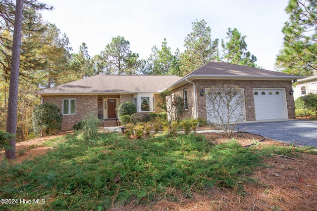 single story home with a garage