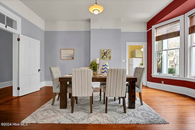 dining room featuring hardwood / wood-style flooring