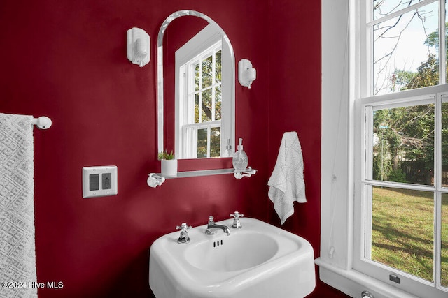 bathroom with sink and a healthy amount of sunlight