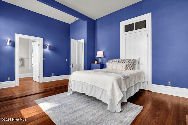 bedroom featuring dark hardwood / wood-style floors