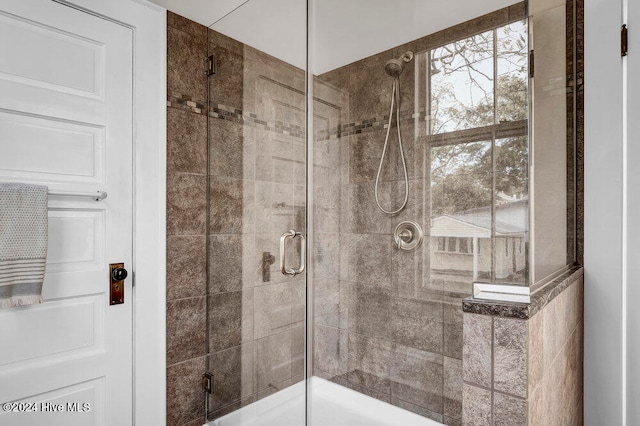 bathroom featuring walk in shower