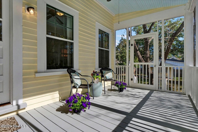 sunroom / solarium with vaulted ceiling