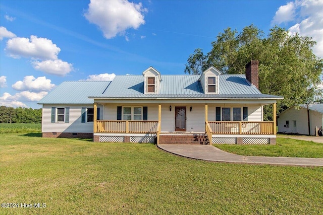 view of front of house featuring covered porch and a front yard