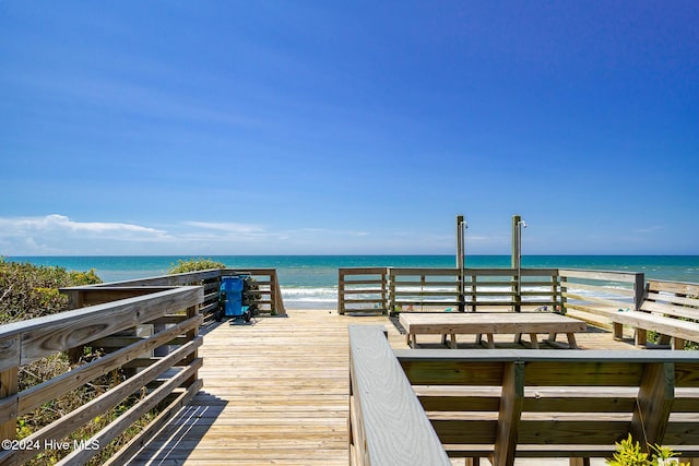 view of community featuring a view of the beach and a water view