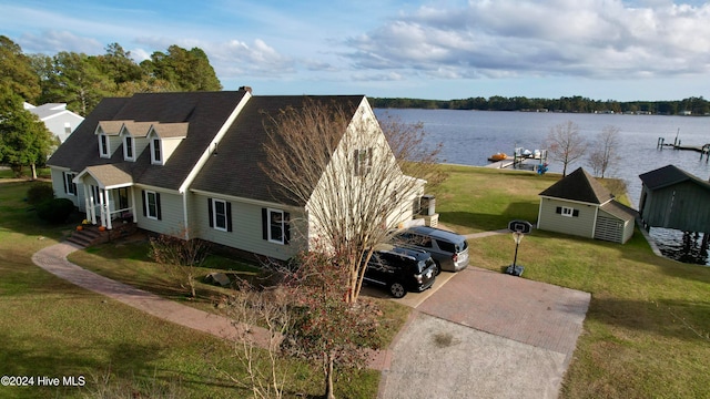 exterior space with a water view