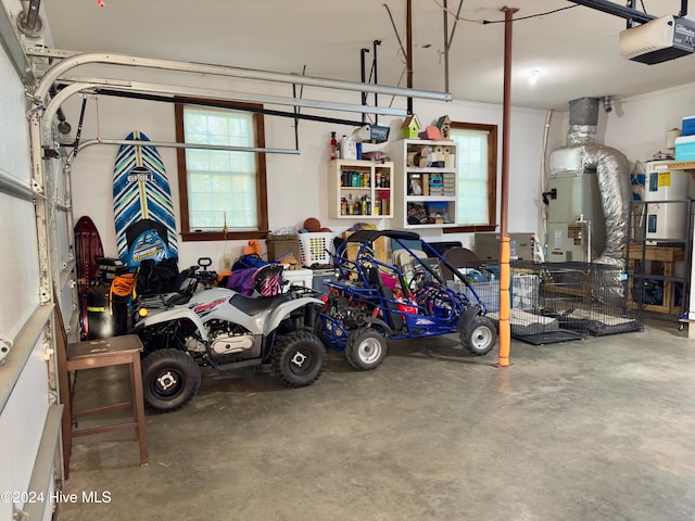 garage featuring heating unit and a garage door opener