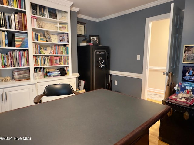 office space featuring light hardwood / wood-style floors and ornamental molding