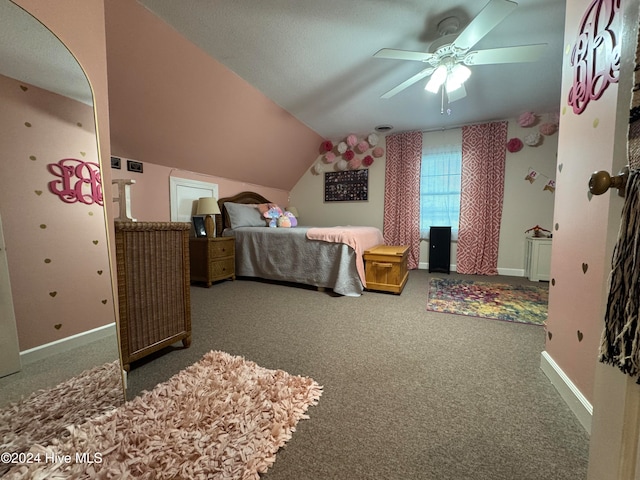 carpeted bedroom with a textured ceiling, ceiling fan, and vaulted ceiling