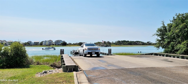 view of dock with a water view