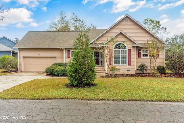 single story home featuring a garage and a front lawn