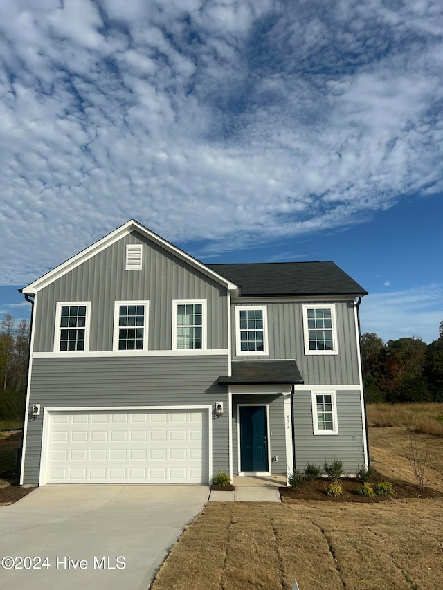 view of front of home with a garage