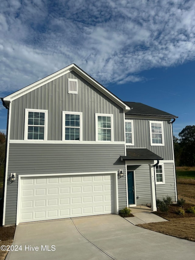 view of front of house with a garage