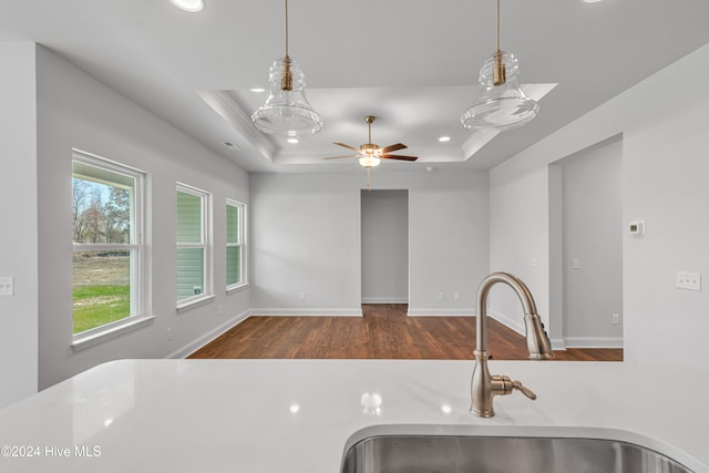 kitchen featuring plenty of natural light, sink, and pendant lighting