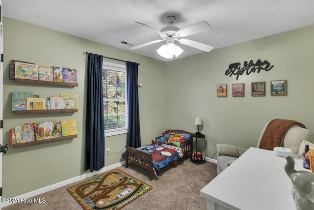 bedroom with ceiling fan and carpet floors