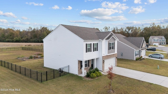 view of home's exterior featuring a garage and a yard