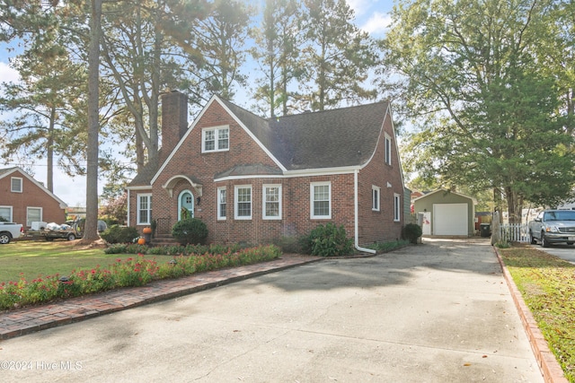 view of front of home featuring an outbuilding and a garage