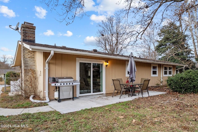 back of property with a patio area