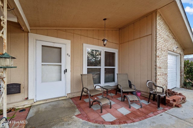 doorway to property with a patio area