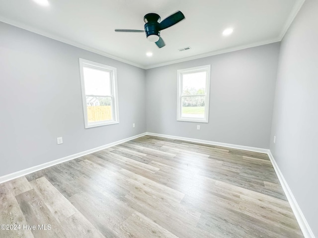 unfurnished room with ornamental molding, ceiling fan, and light hardwood / wood-style floors