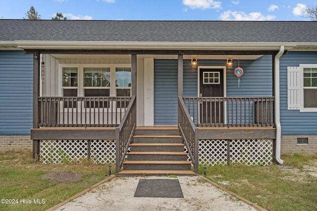 entrance to property with a porch