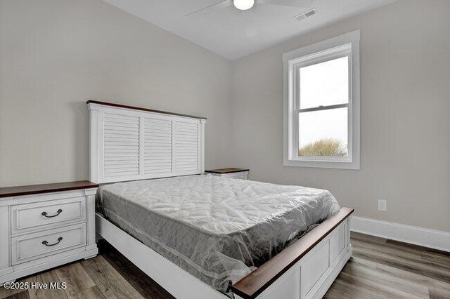 empty room featuring ceiling fan and light wood-type flooring