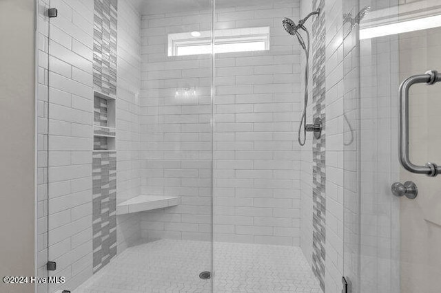 bathroom featuring walk in shower