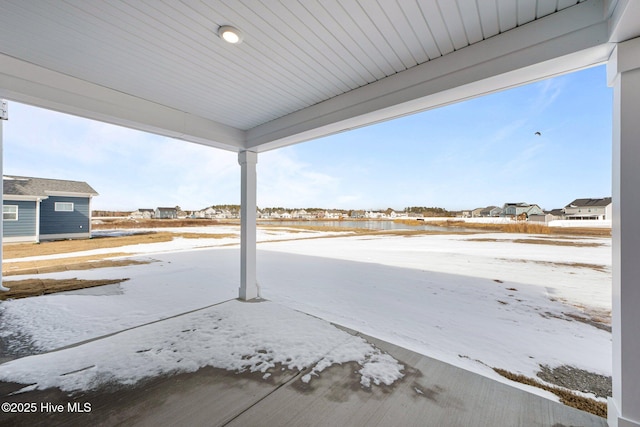 view of snow covered patio