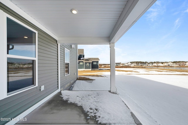 view of snow covered patio