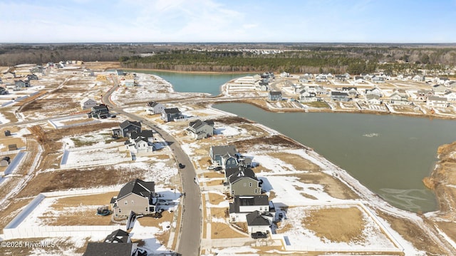 aerial view with a water view and a residential view