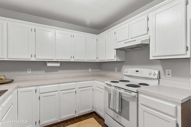 kitchen with wood-type flooring, white cabinetry, and white range with electric cooktop