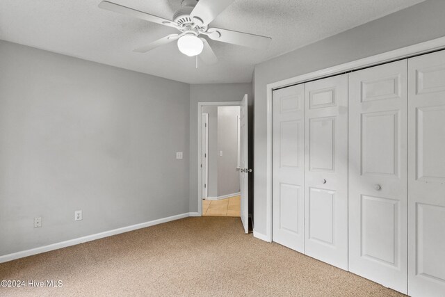 bathroom with hardwood / wood-style flooring, vanity, toilet, and walk in shower