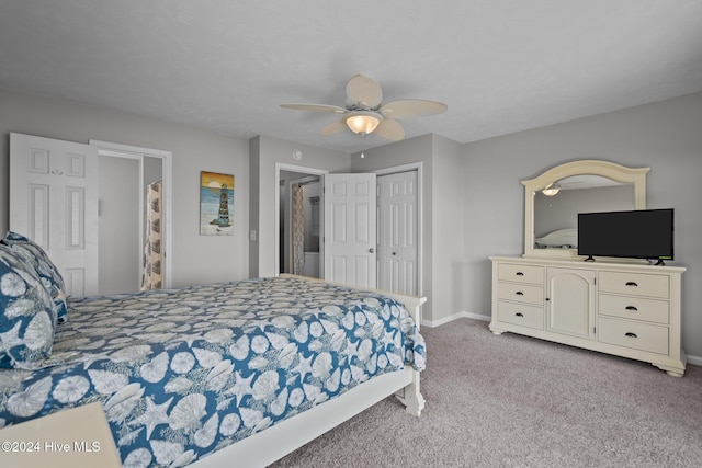 bedroom featuring a closet, carpet floors, baseboards, and ceiling fan