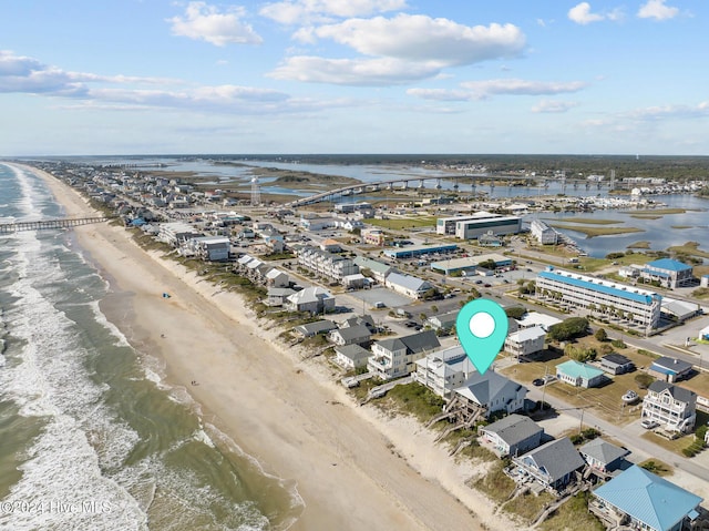 bird's eye view with a view of the beach and a water view