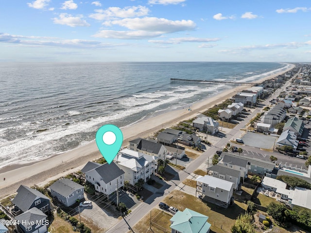 drone / aerial view with a view of the beach and a water view