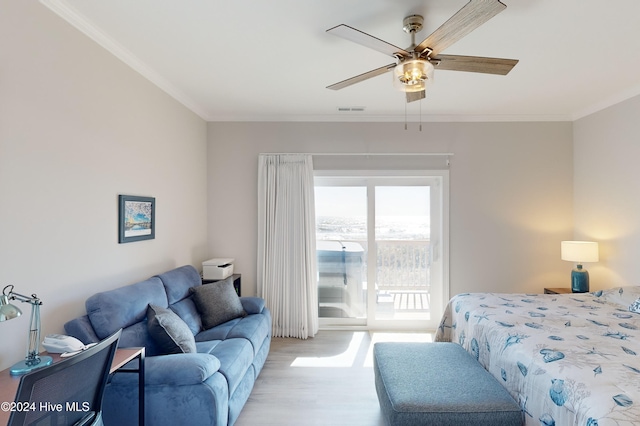 bedroom with light wood-type flooring, access to exterior, ceiling fan, and crown molding