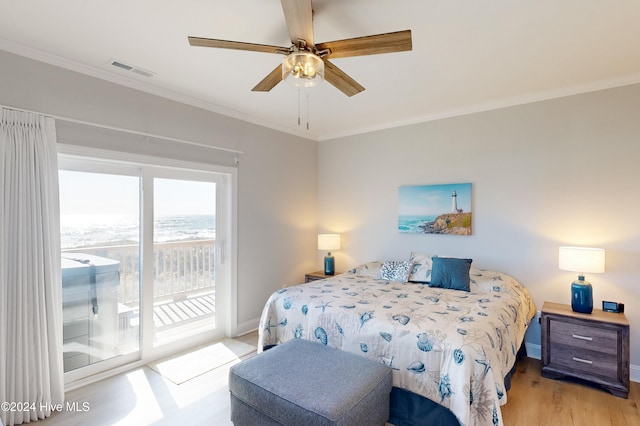 bedroom with ceiling fan, crown molding, light hardwood / wood-style floors, and access to exterior