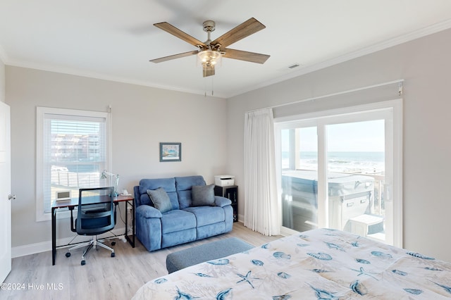 bedroom with ornamental molding, light wood-type flooring, and ceiling fan