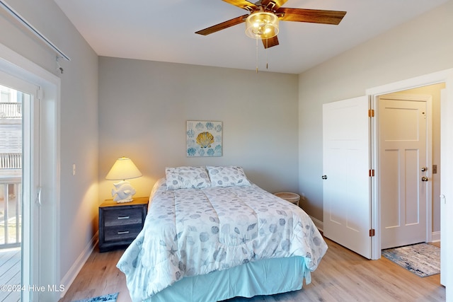 bedroom with light wood-type flooring and ceiling fan