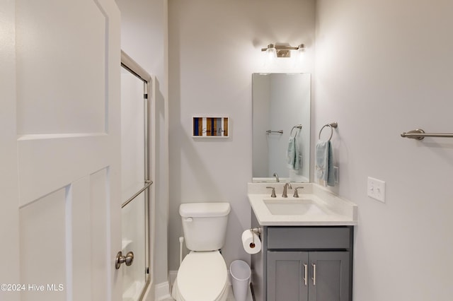 1796 New River Inlet Rd, North Topsail Beach, NC 28460 - full bathroom featuring vanity, toilet, a shower, and baseboards