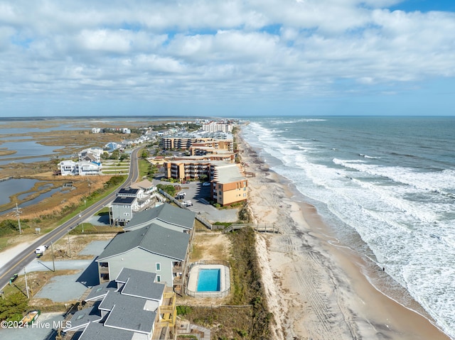 aerial view with a beach view and a water view