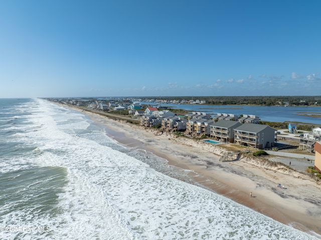 property view of water featuring a beach view