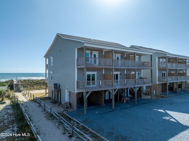 exterior space with a water view