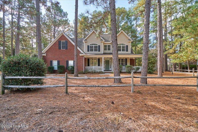 view of front of property featuring covered porch